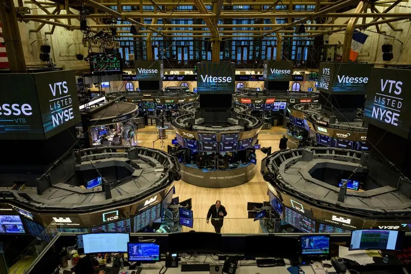 A busy trading floor showcasing U.S. stock market activity amidst fluctuations and investor sentiment